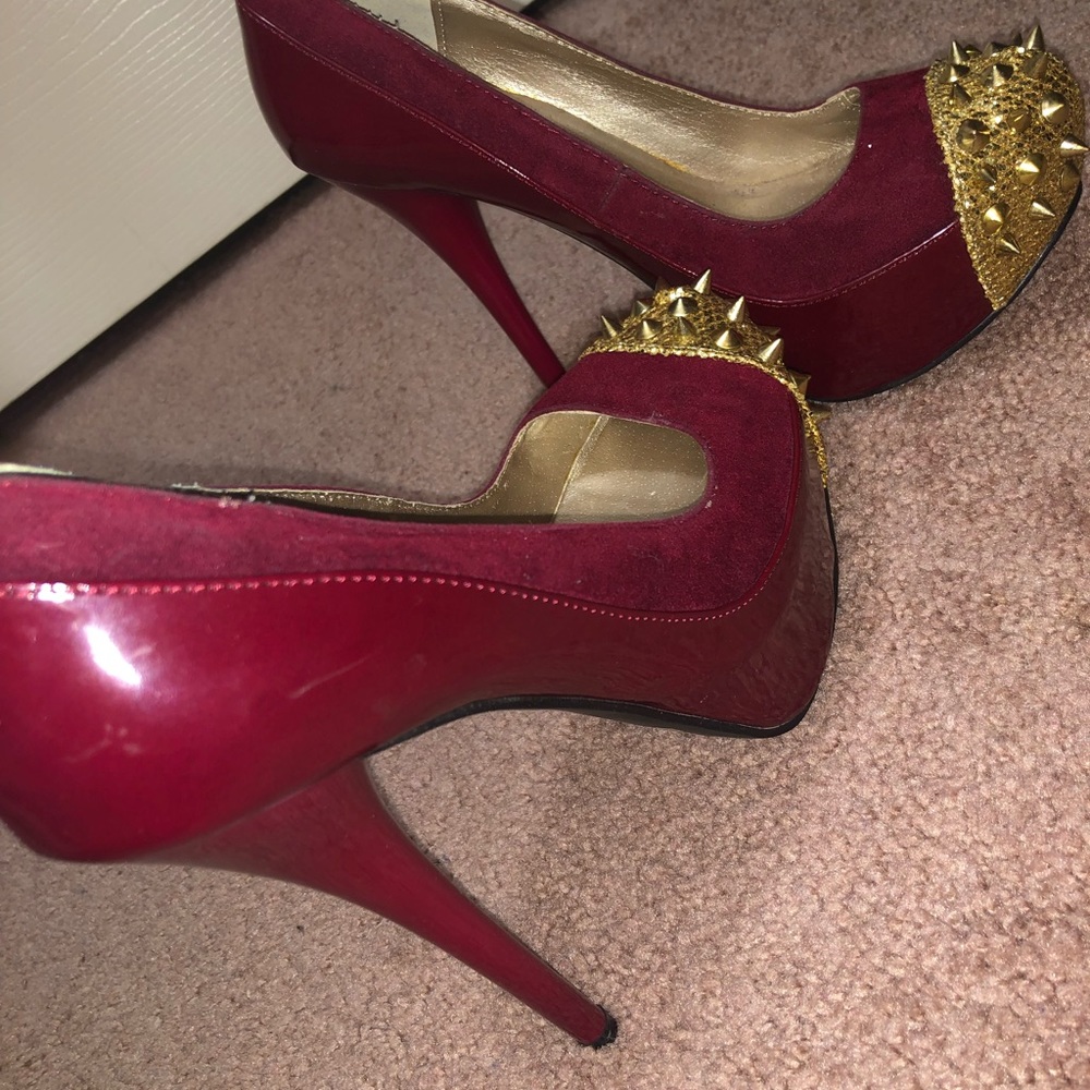 Red spike heels